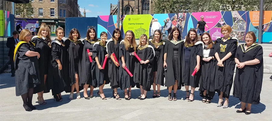 BSc (Hons) Oral Health Sciences graduation students with tutors